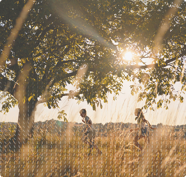 Healthy children running in field